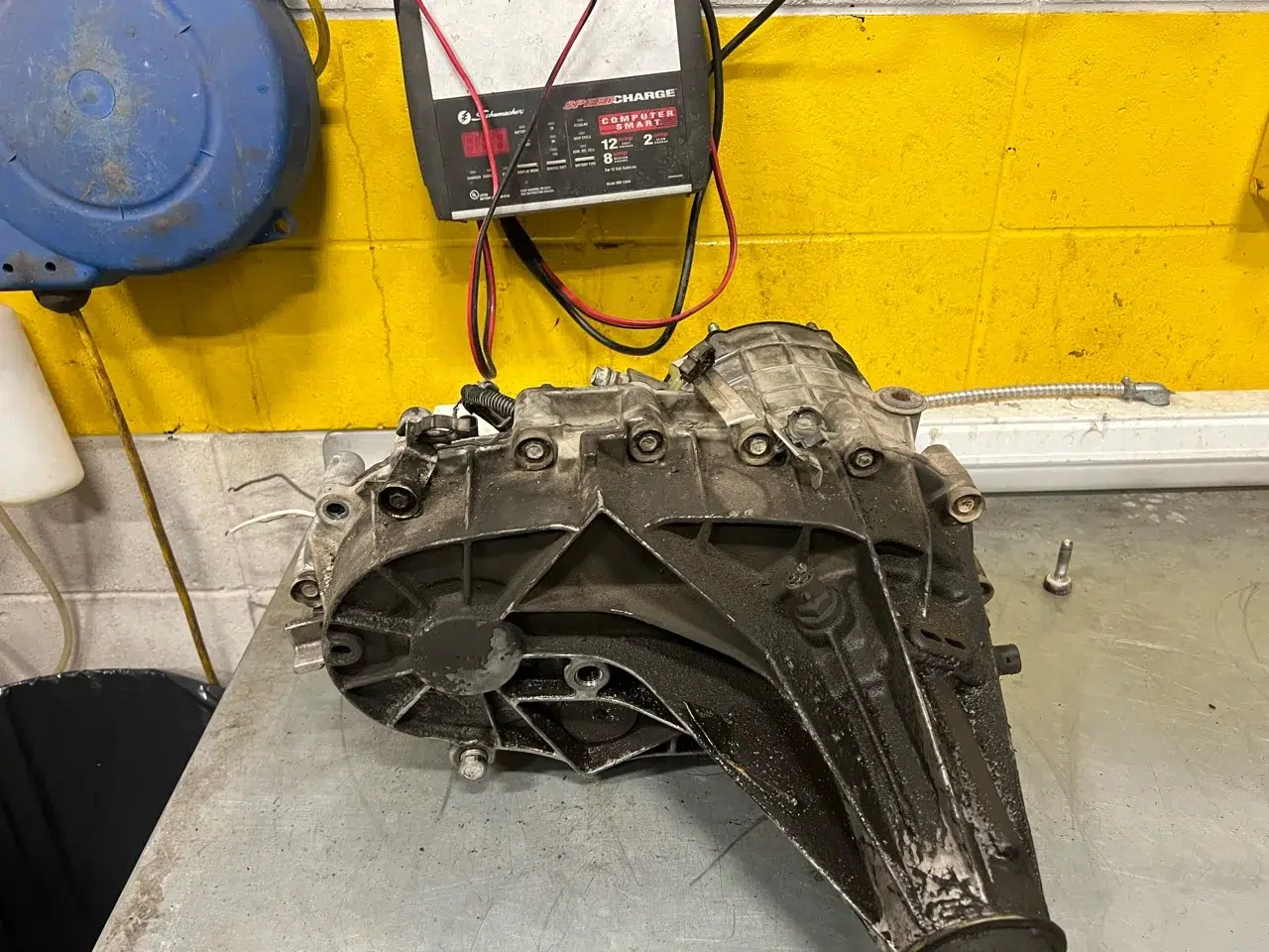 Removed Silverado transfer case resting on the AMR workbench