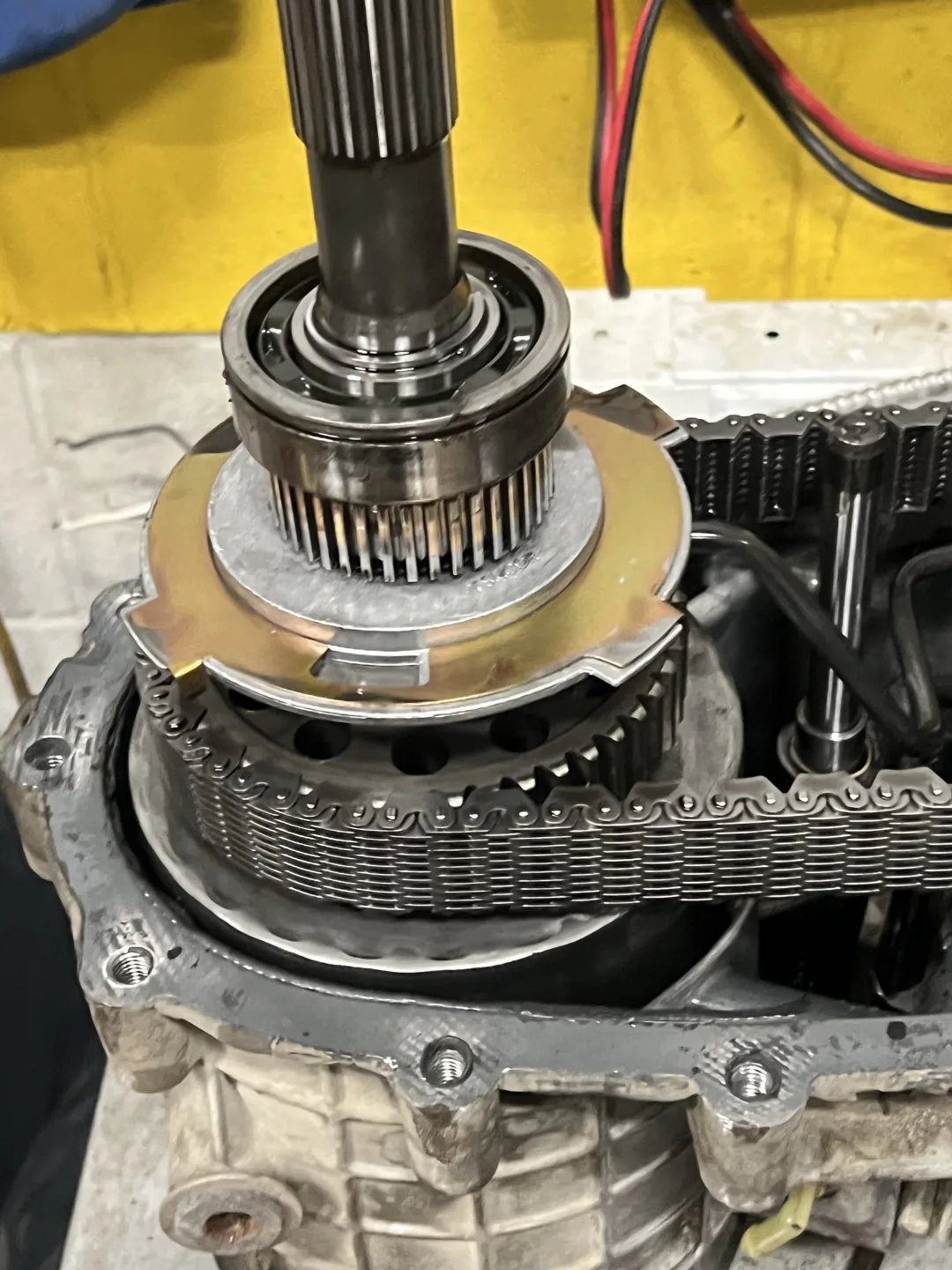 Close view of the transfer-case shaft, bearing and chain assembly