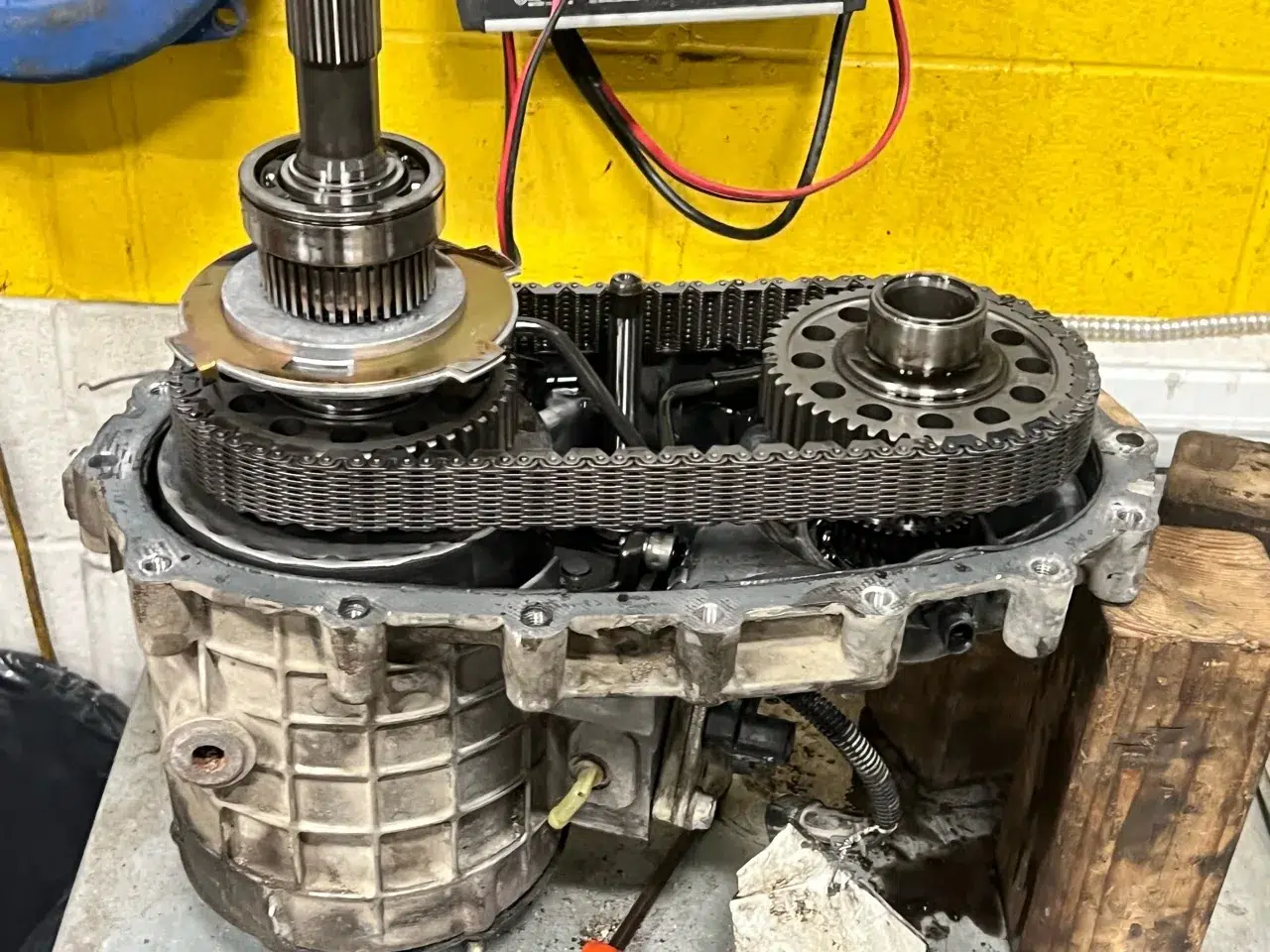 Opened Silverado transfer case with the chain and sprockets exposed