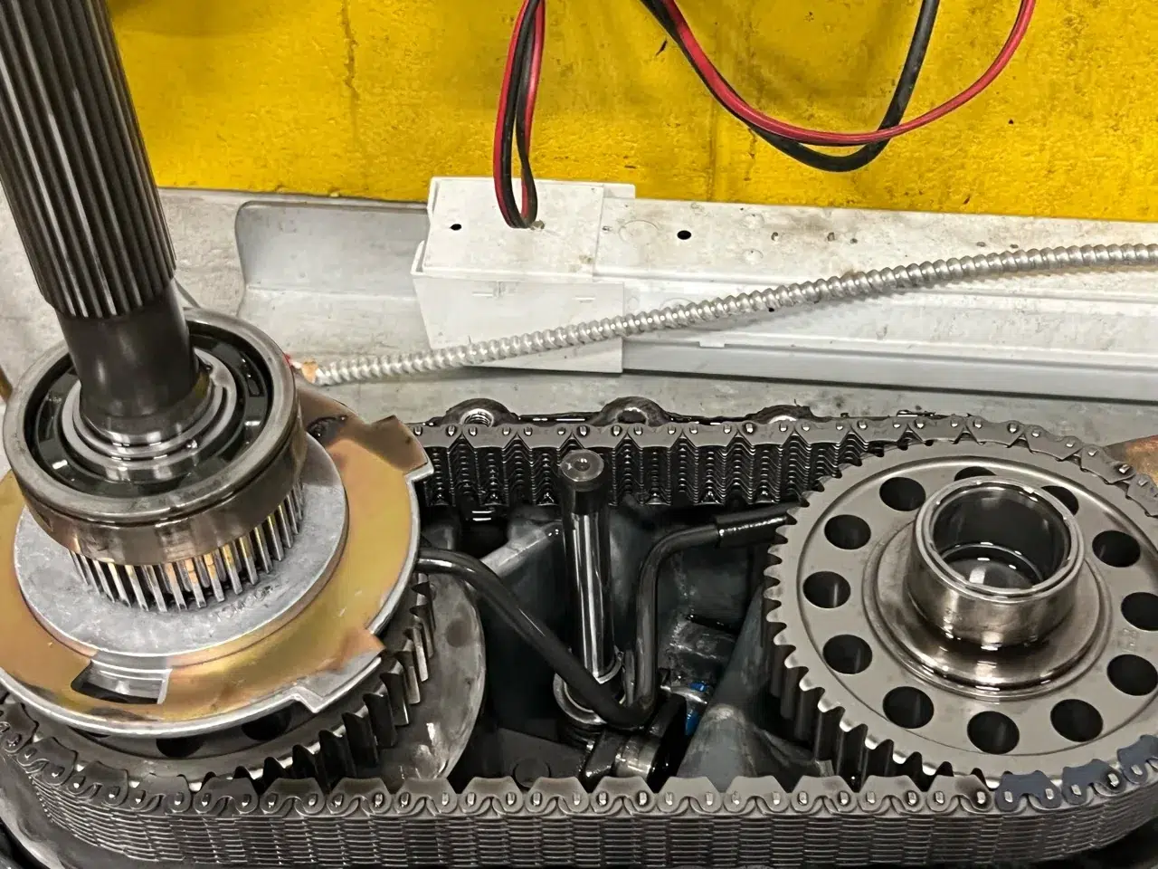 Chain and sprockets inside the opened Silverado transfer case